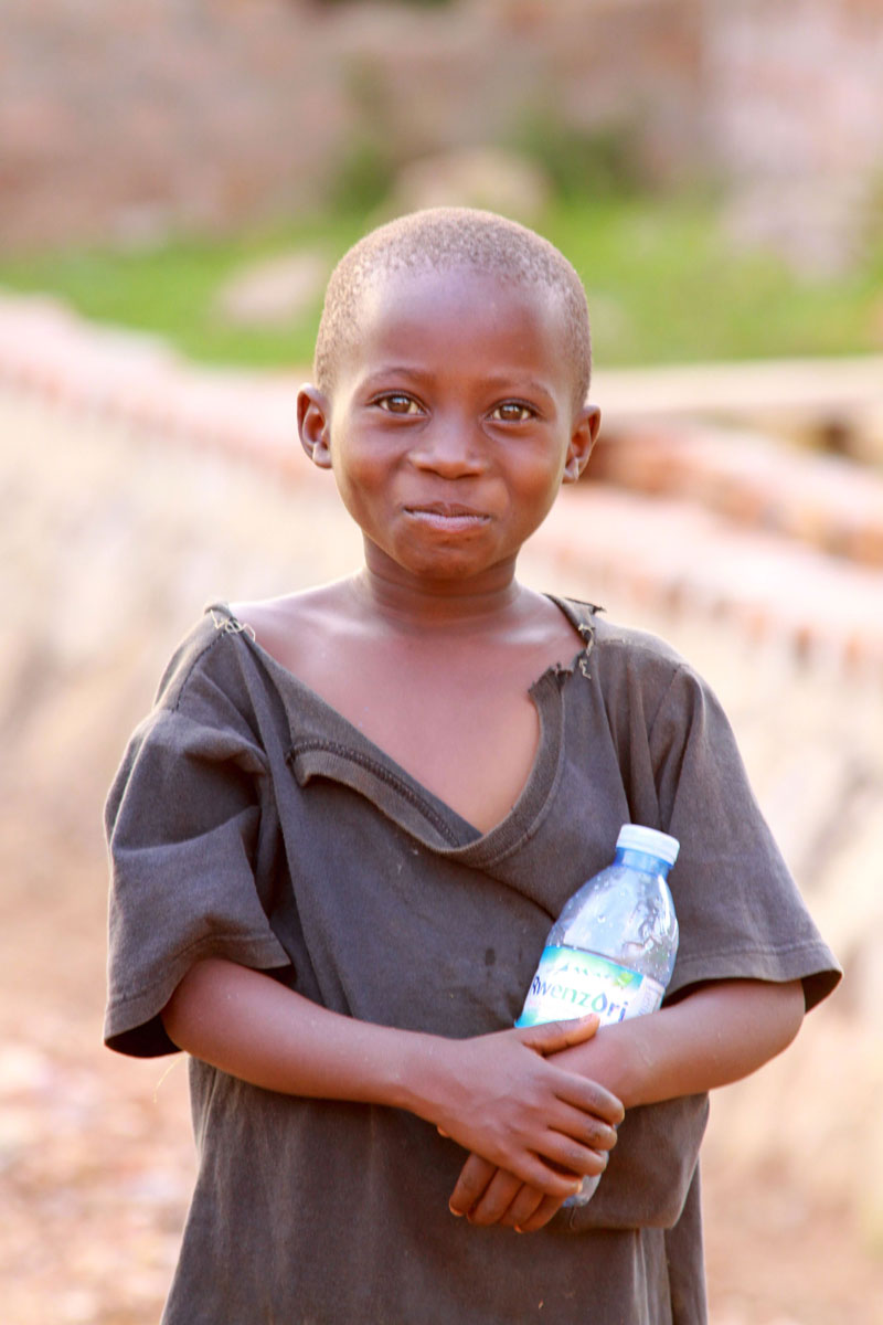 Boy with Water Uganda